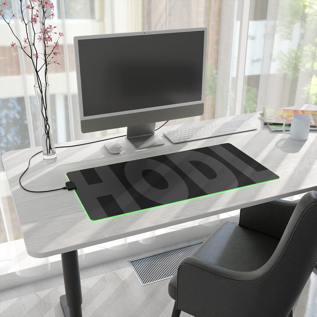A black gaming mousepad for traders made with smooth soft cloth and fine fabric, HODL written in bold dark grey, LED light strip surrounds the edges, Memes for traders