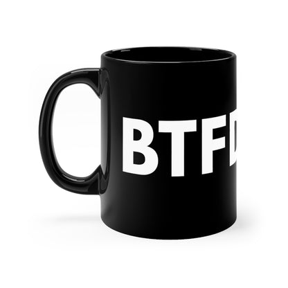 A black ceramic mug BTFD written in white across the surface, C shaped handle, Memes for traders