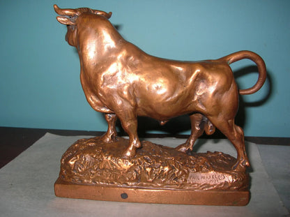 Antique Pompeian Bronze-clad bookends by Paul Herzel, featuring a bull and a bear, symbolizing Wall Street, showcasing intricate detail and craftsmanship.